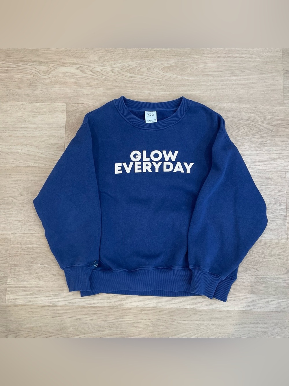 Zara Navy Crewneck Sweater with White "Glow Everyday" Text